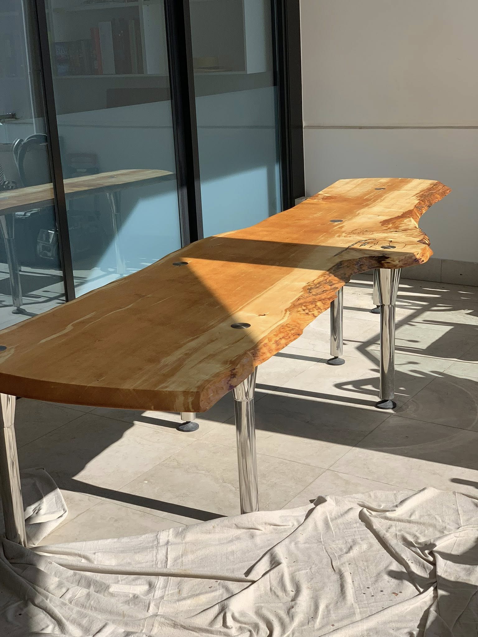 Huon Pine Live Edge Table - There’s nothing quite like Huon Pine, its natural grain, rich tones, and durability make it one of Australia’s most prized timbers. This stunning transformation brought out the true beauty of the live edge slab. The table was carefully restored, polished, and finished to highlight its organic curves and golden hues.